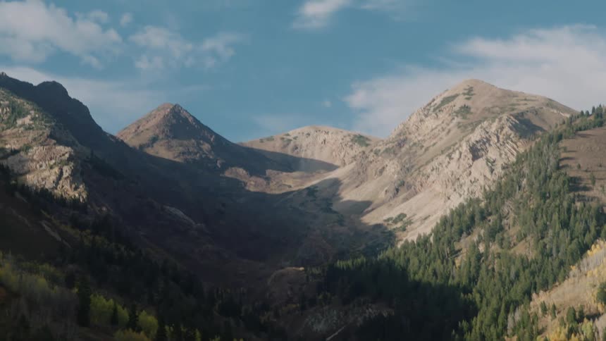 Mountains with greenish conifers