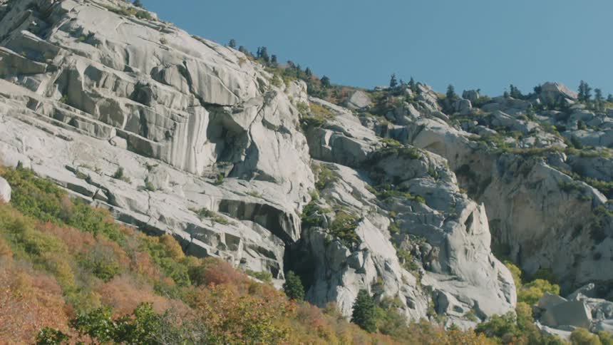 Mountainous landscape with cliffs and vegetation