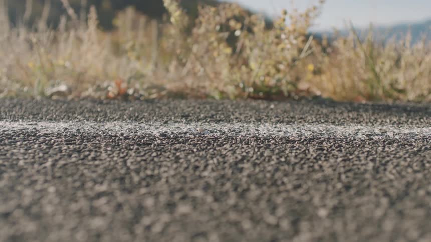 A person runs by on the road