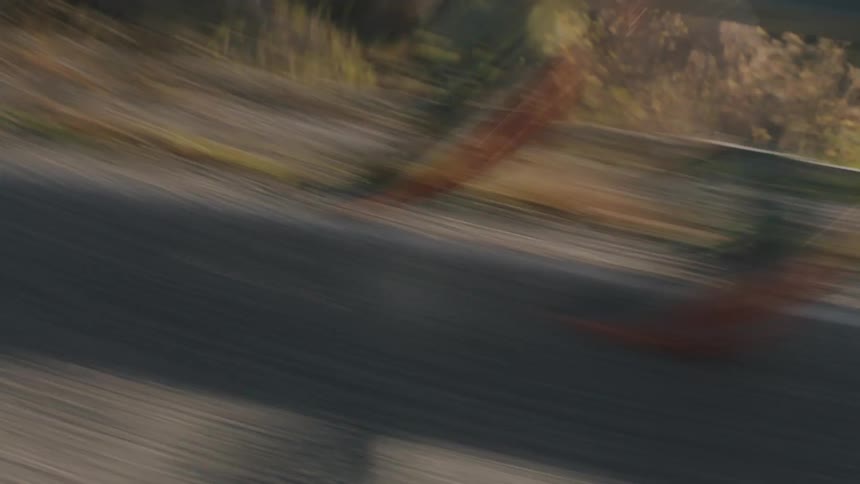 A man is running fast in a rural area