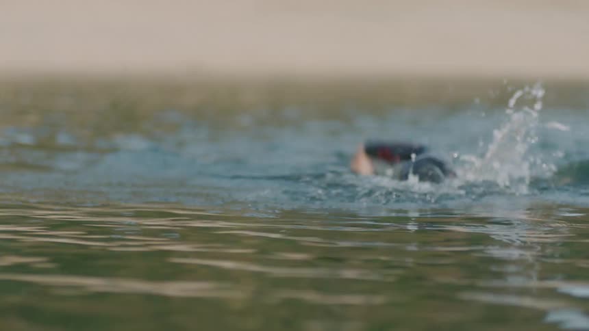 Man swimming in a lake