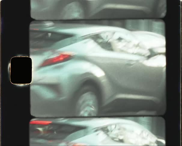Blurry Cars Passing Rapidly in Downtown Los Angeles on Super 8mm