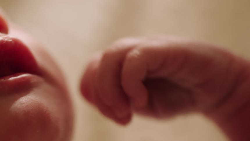 Close up of a moving babys hands