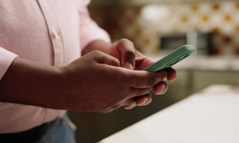 A footage of a person operating a smartphone