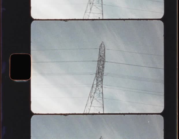 Electrical Transformer Against the Blue Sky on Super 8mm