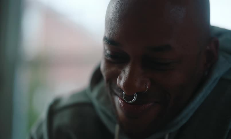 An image of a black male smiling
