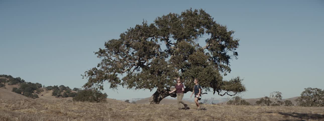 Two women argue as they hike