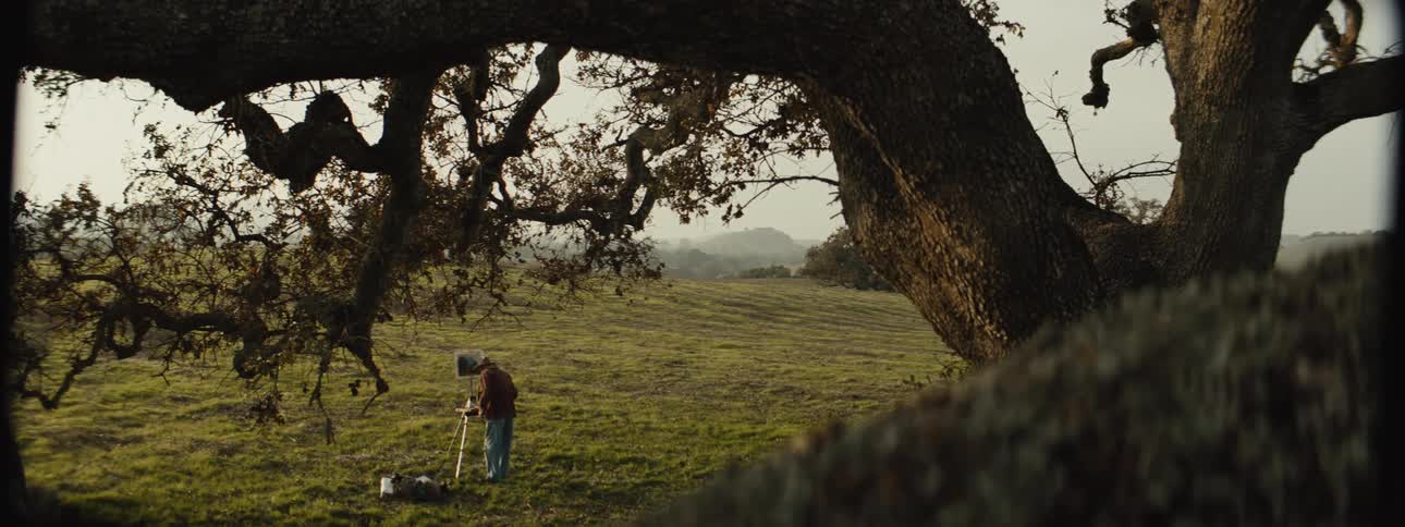 An image of a person painting out in the nature