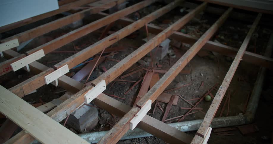Framework of a floor under construction reveals the ground
