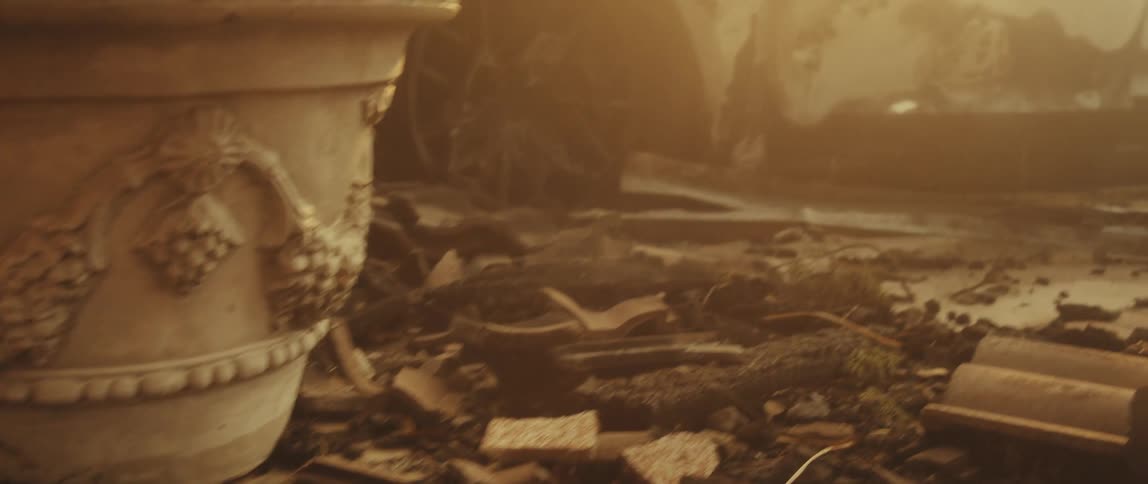 Car destroyed and burned amidst rubble