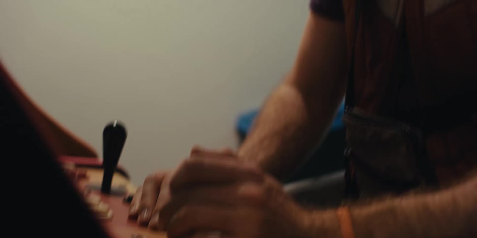 Concentrated man playing in an arcade game