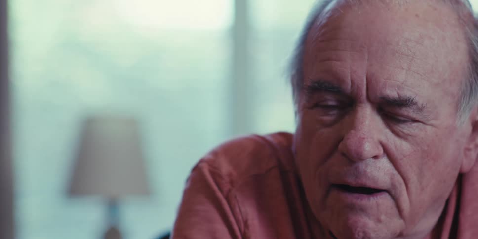 Portrait of an elderly man sitting thoughtfully