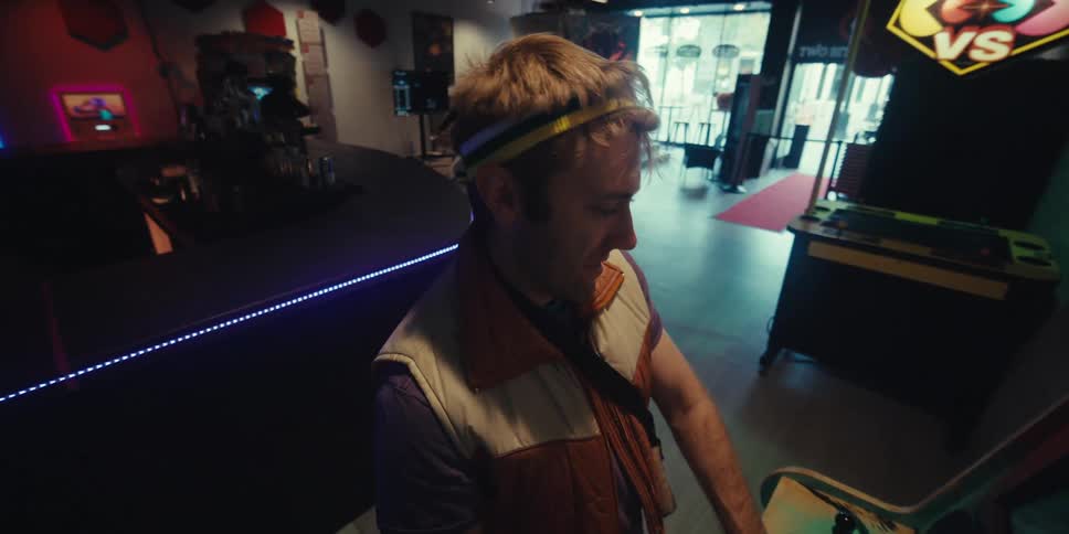 Man having fun while playing in an old game room