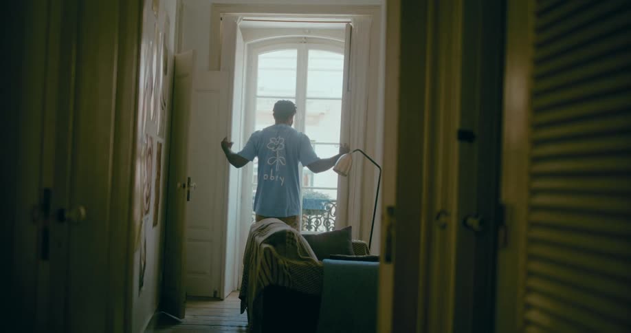 A clip of a man opening the window