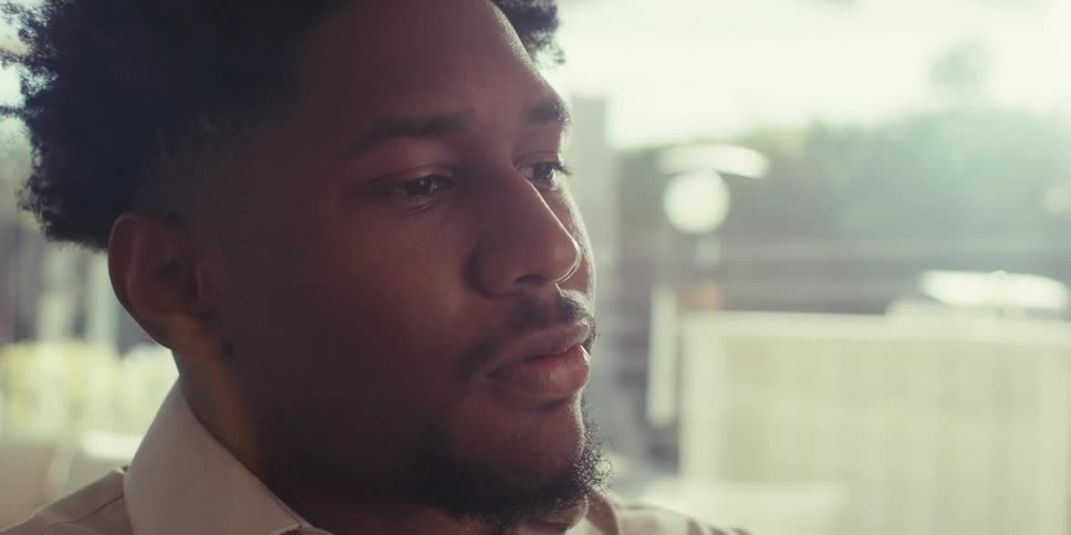 Portrait of a man sitting and thinking