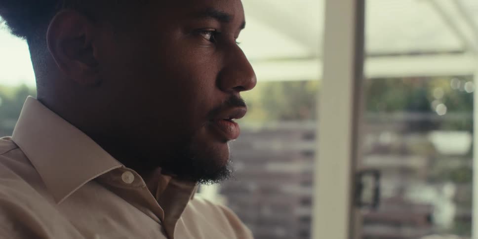 Portrait of a man in a pensive indoor space