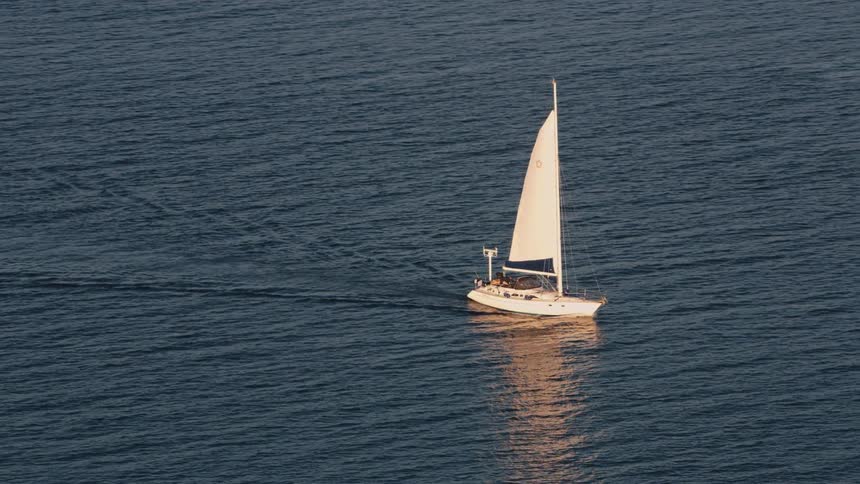 A boat is traveling in the water