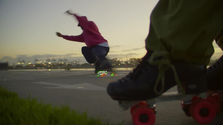 Man dancing on roller skates outdoors