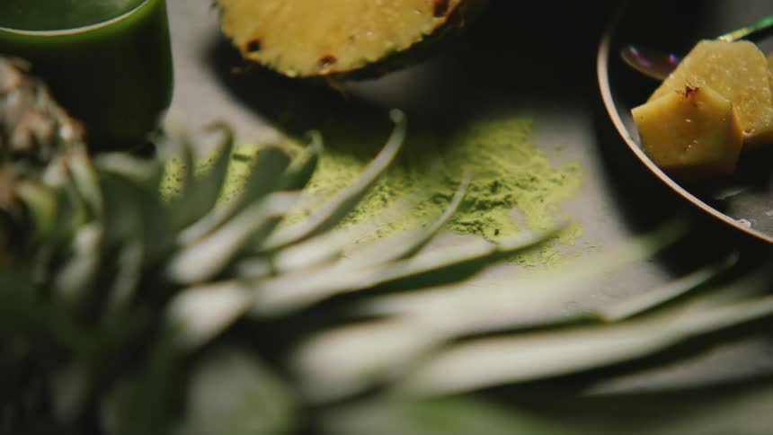Fruit is sliced and whole on the table