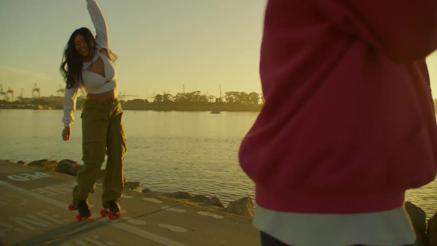 Woman and a man dancing on roller skates