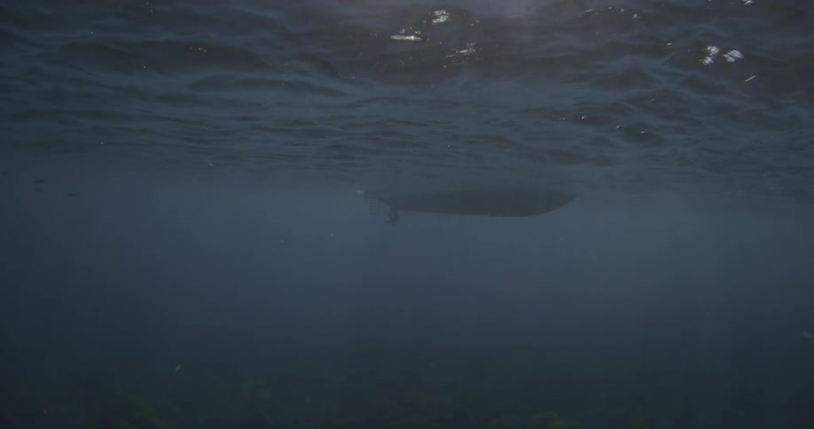 A boat is floating in the water up ahead