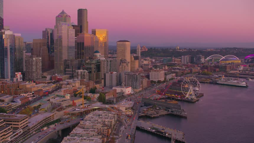 Aerial panorama of sydneys waterfront metropolis against a purple sky