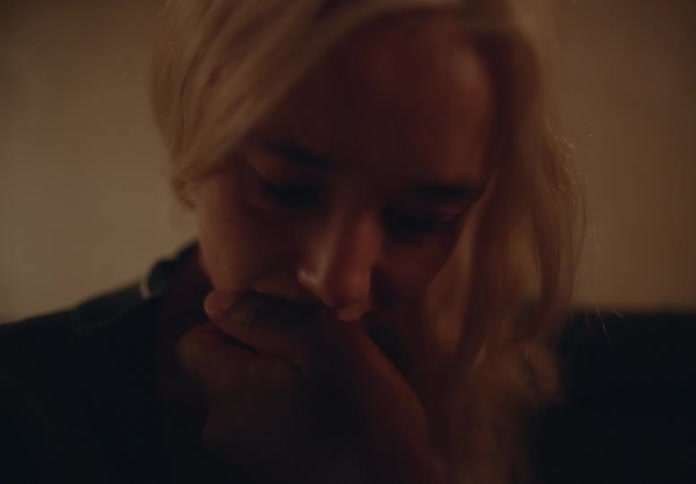 A clip of a person romancing a womans face
