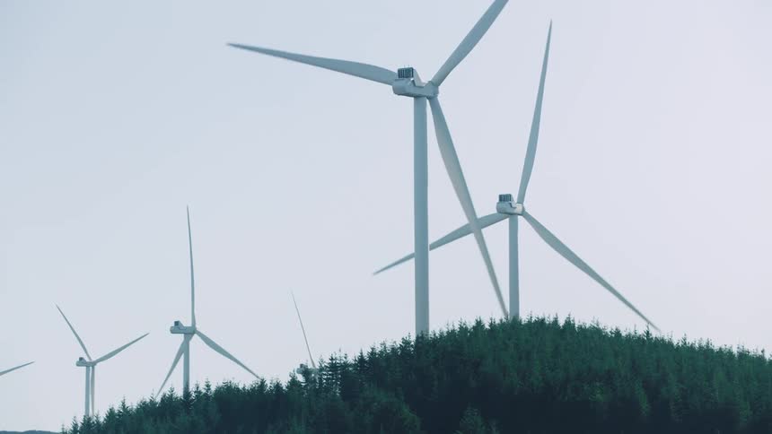 Wind turbines on mountain peaks