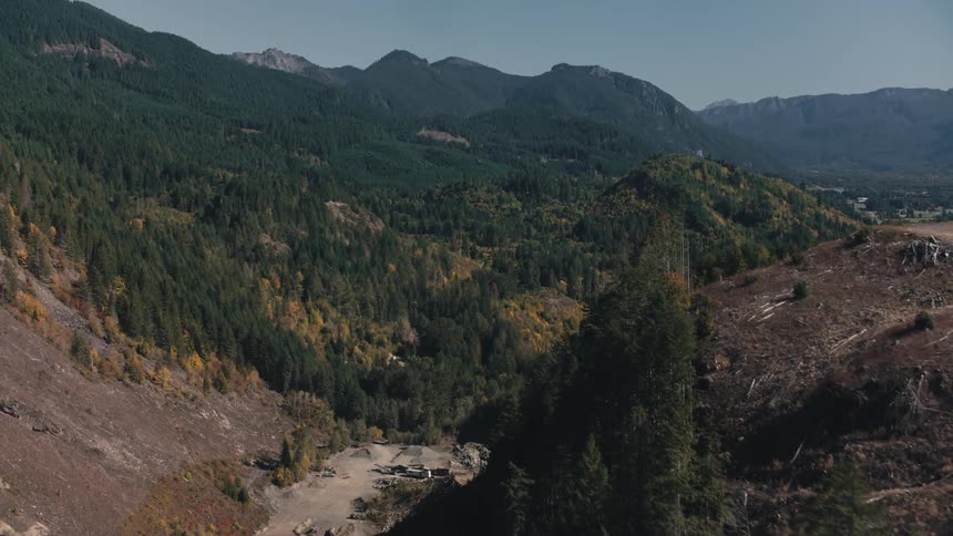 Aerial landscape of mountains with dense green forests