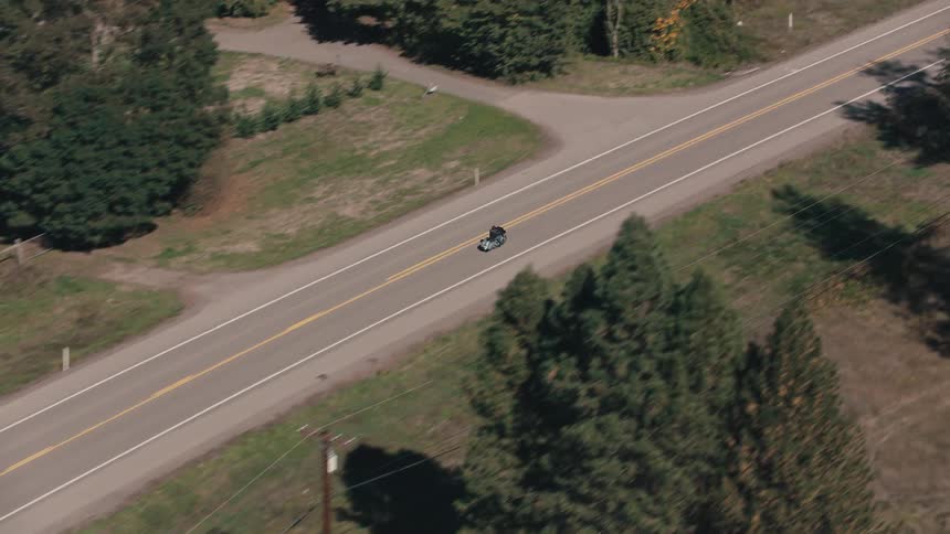 Motorcycle traveling on a highway during the day