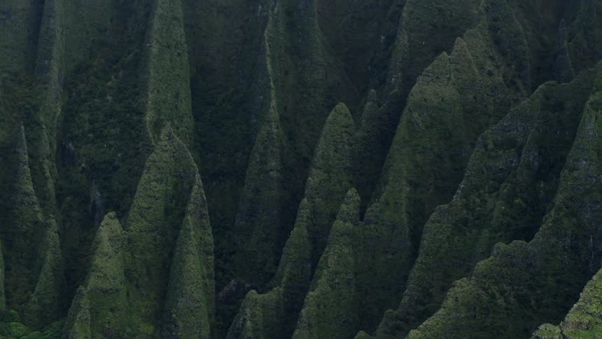Mountains with erosion and greenish moss