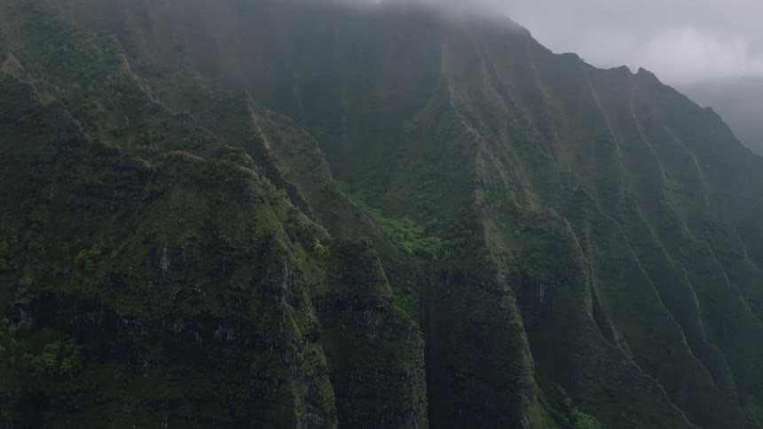 Steep greenish mountain wall