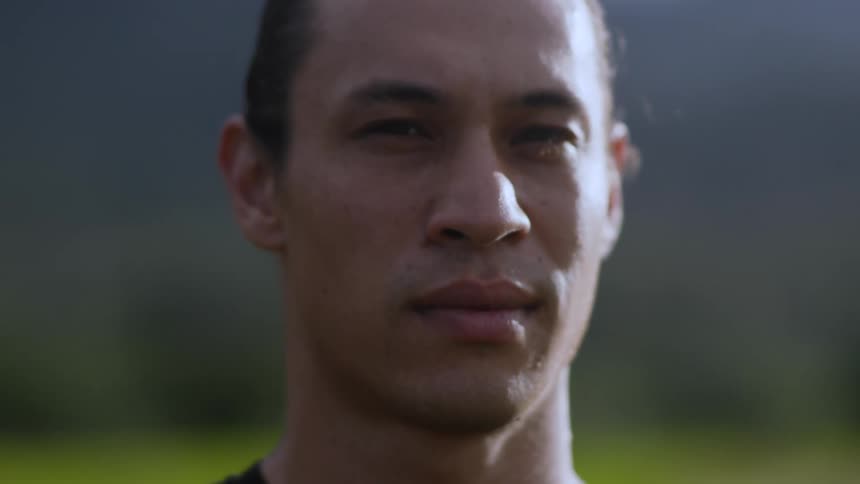 Portrait of a young man with a neutral expression