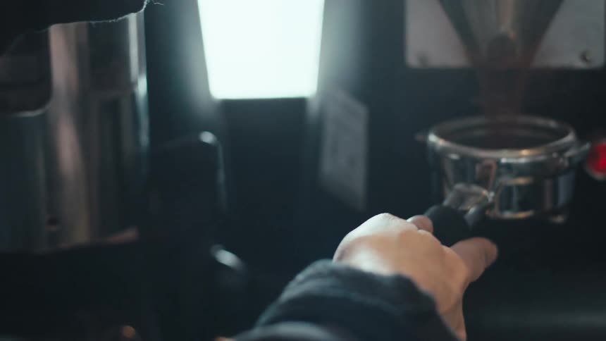 A clip of a person making coffee