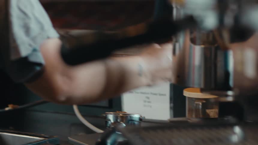 A clip of a person making a coffee