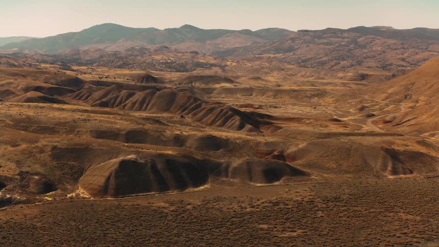 Brown hills cover the huge landscape