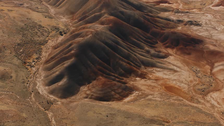 An aerial clip of hill in the desert