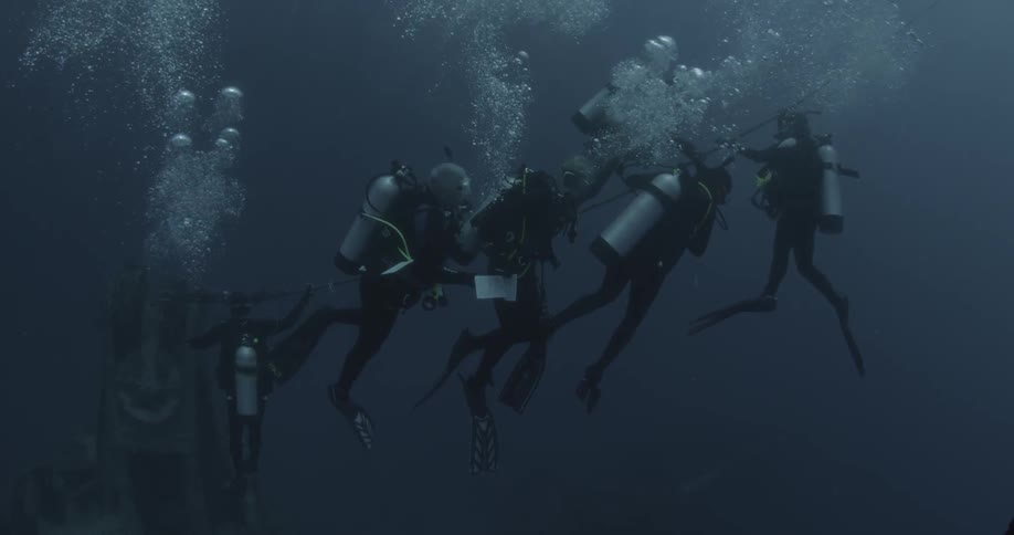 Group of scuba divers in the ocean