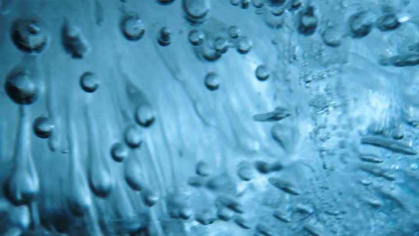Extreme close up on a spinning ice