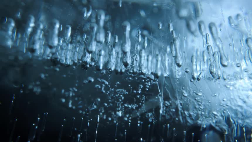 Close up of a glacier with sun reflection