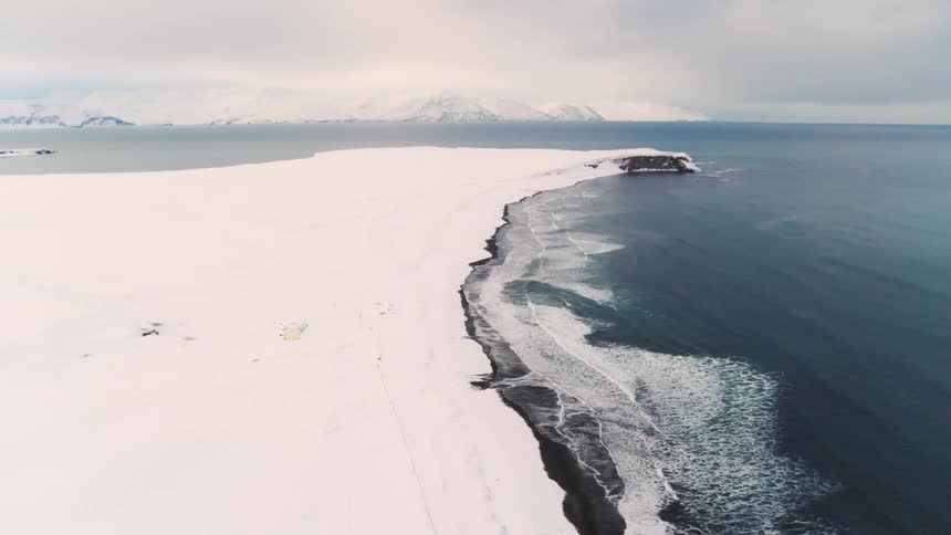 An aerial clip of an arctic shore