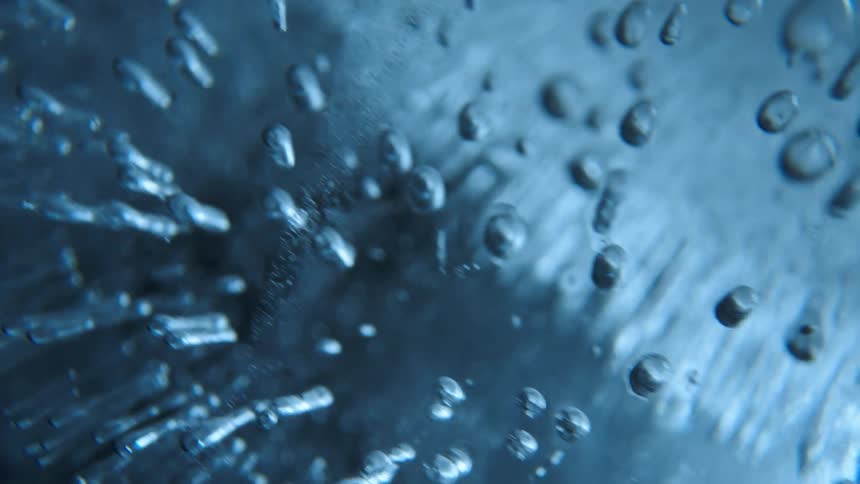 The ice is spinning in a dark room