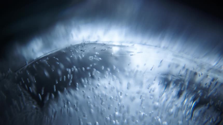 Extreme close up of ice with water bubbles