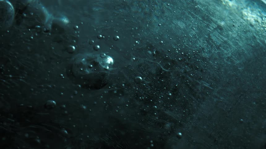 Extreme close up of ice with water droplets