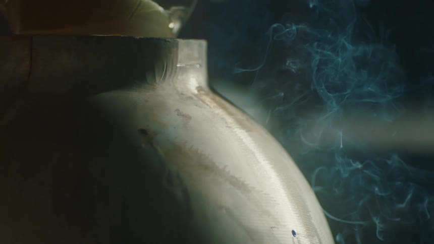 Forged glass on top of a metal container