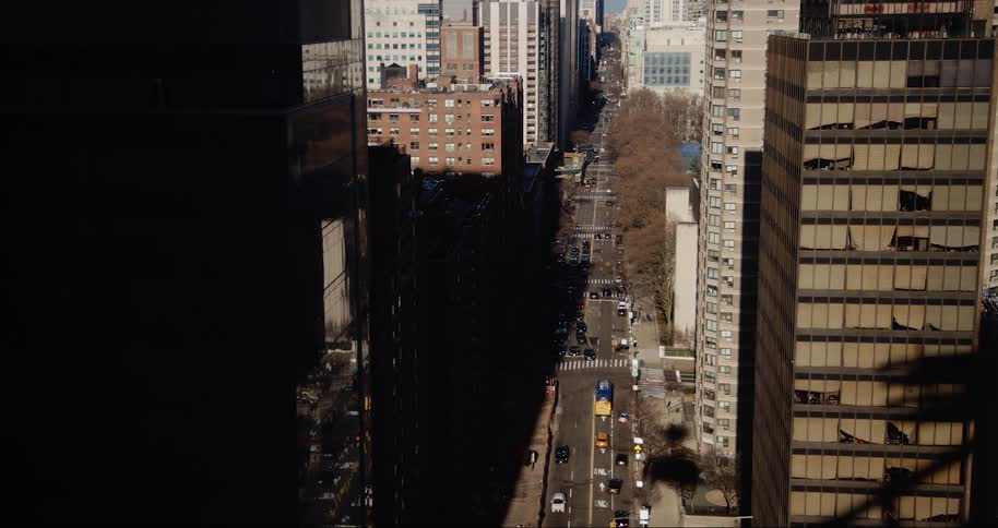 Traffic flows steadily through intersections in the center of the city