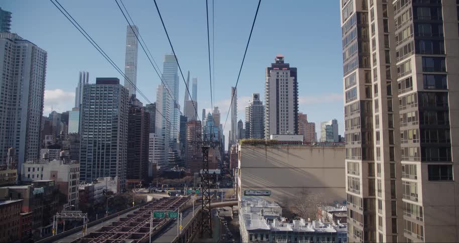 An aerial clip of a bridge in a city