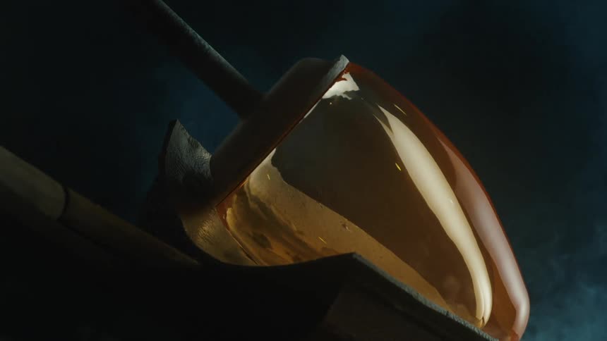 Close up of a forged glass exhaling smoke