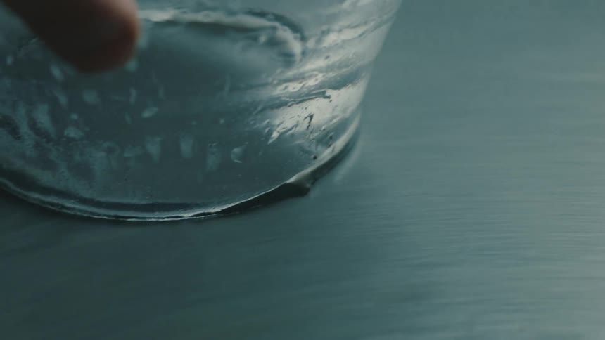 Hand shaping an object on a sheet of metal