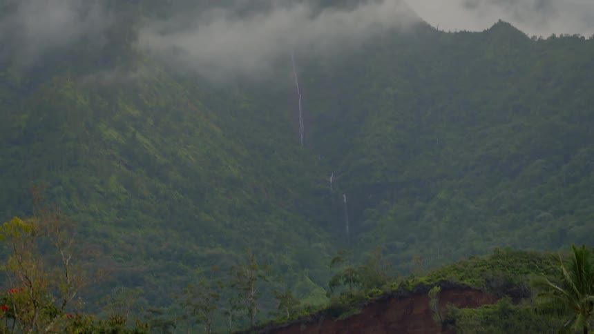 An aerial clip of a forest mountain